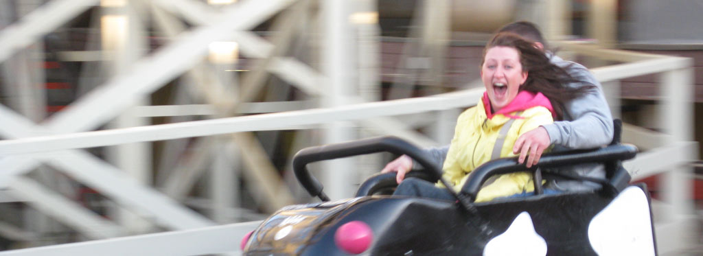 Photo of a girl smiling on a rolle rcoaster